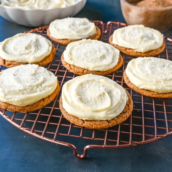 Soft Gingerbread Cookies with Cream Cheese Frosting. These Frosted Molasses Ginger Cookies are the perfect Christmas Cookie. Soft in the center with the perfect crisp edges. The sweet cream cheese frosting pairs perfectly with the spiced gingerbread cookie. This is a quintessential Christmas cookie recipe that gets rave reviews!