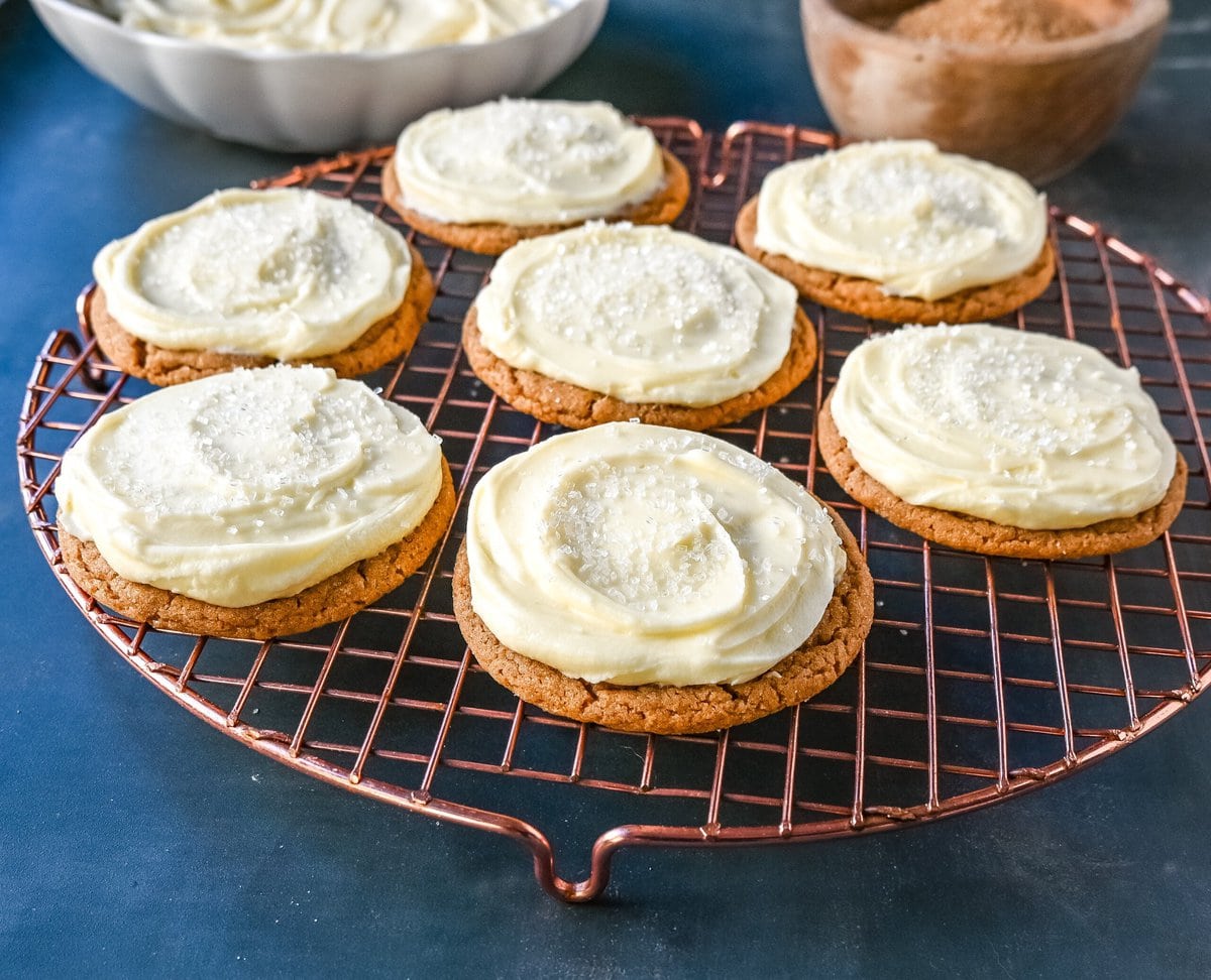 Soft Gingerbread Cookies with Cream Cheese Frosting. These Frosted Molasses Ginger Cookies are the perfect Christmas Cookie. Soft in the center with the perfect crisp edges. The sweet cream cheese frosting pairs perfectly with the spiced gingerbread cookie. This is a quintessential Christmas cookie recipe that gets rave reviews!