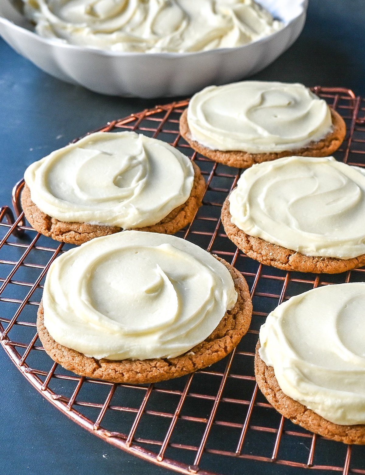 Soft Gingerbread Cookies with Cream Cheese Frosting. These Frosted Molasses Ginger Cookies are the perfect Christmas Cookie. Soft in the center with the perfect crisp edges. The sweet cream cheese frosting pairs perfectly with the spiced gingerbread cookie. This is a quintessential Christmas cookie recipe that gets rave reviews!