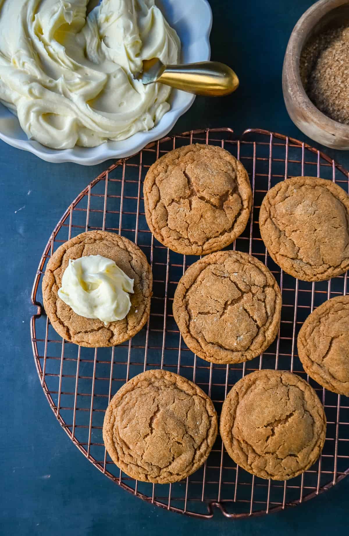 Soft Gingerbread Cookies with Cream Cheese Frosting. These Frosted Molasses Ginger Cookies are the perfect Christmas Cookie. Soft in the center with the perfect crisp edges. The sweet cream cheese frosting pairs perfectly with the spiced gingerbread cookie. This is a quintessential Christmas cookie recipe that gets rave reviews!
