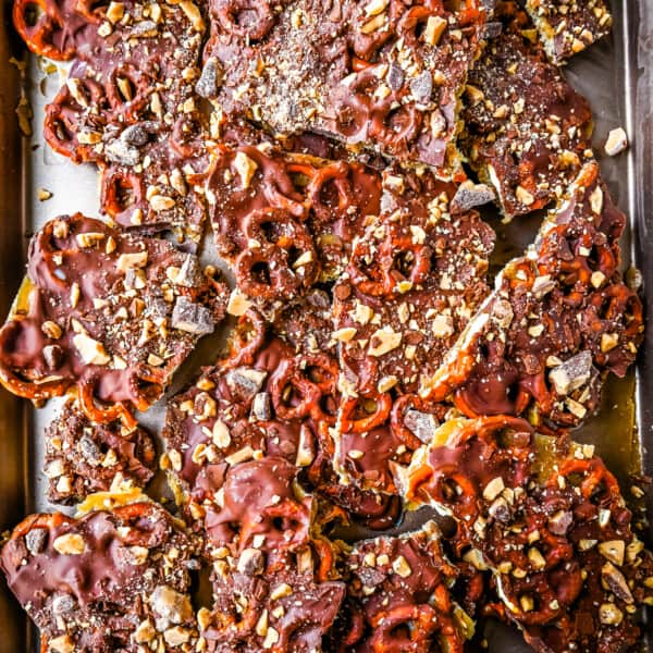 Toffee Pretzel Christmas Crack. This is Christmas Crack but even better! This homemade chocolate toffee bark is made with crunchy pretzels, soft buttery toffee, rich chocolate, and Heath bar chocolate toffee bits. This is a super easy Christmas crack recipe and perfect to share around the holidays.