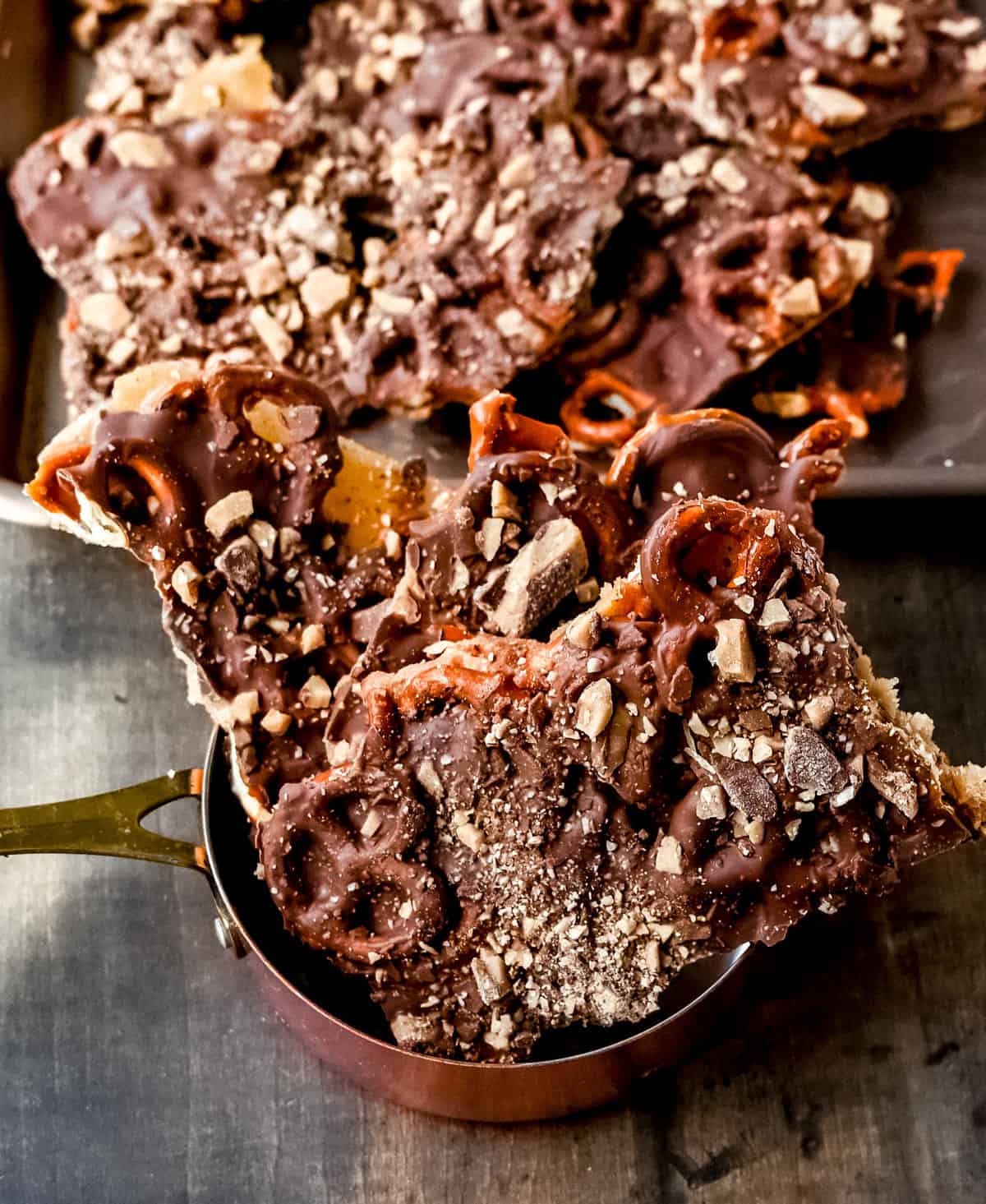 Toffee Pretzel Christmas Crack. This is Christmas Crack but even better! This homemade chocolate toffee bark is made with crunchy pretzels, soft buttery toffee, rich chocolate, and Heath bar chocolate toffee bits. This is a super easy Christmas crack recipe and perfect to share around the holidays.