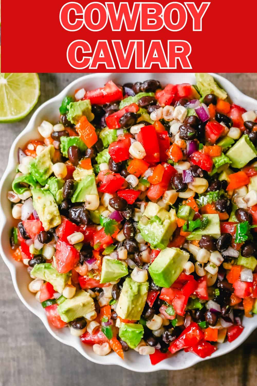 Cowboy Caviar. A popular, crowd-pleasing, fresh salsa appetizer made with black beans, corn, tomatoes, cilantro, avocado, peppers, all tossed in a zesty dressing. 