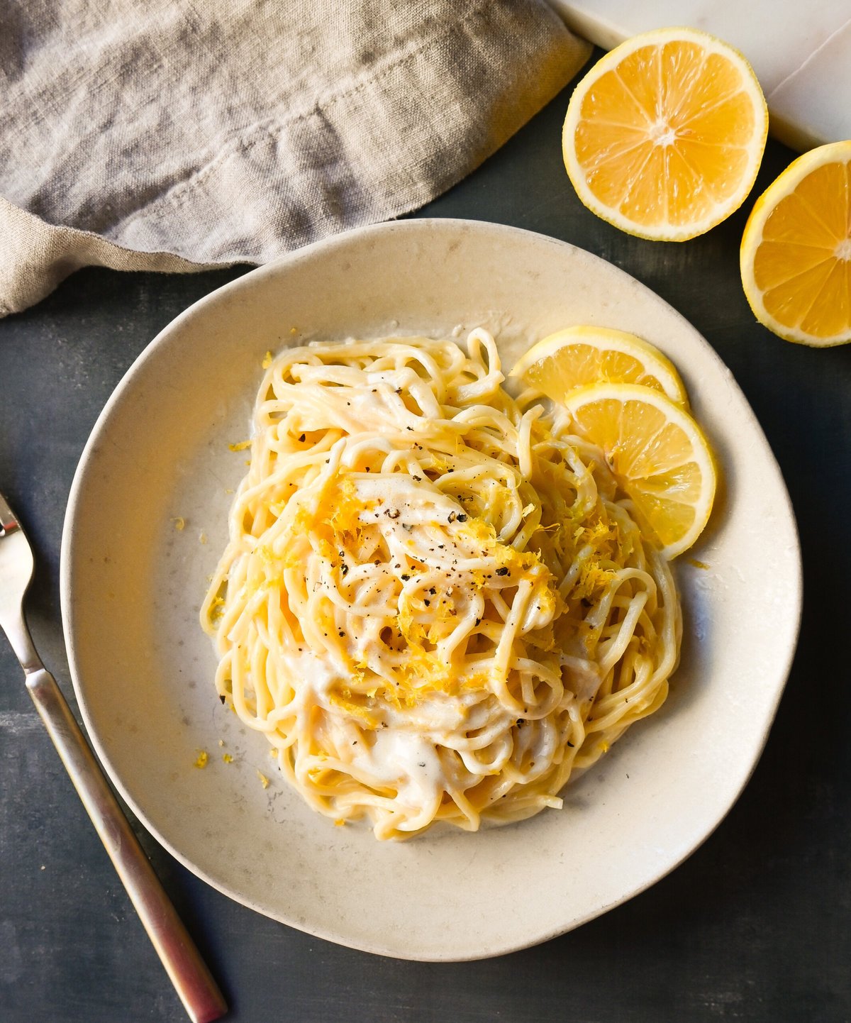 Lemon Pasta (Spaghetti al Limone). This creamy and tangy pasta dish features fresh lemon cream sauce tossed with fresh pasta. This Spaghetti al Limone is vibrant, fresh, and perfectly creamy and is so easy to make!
