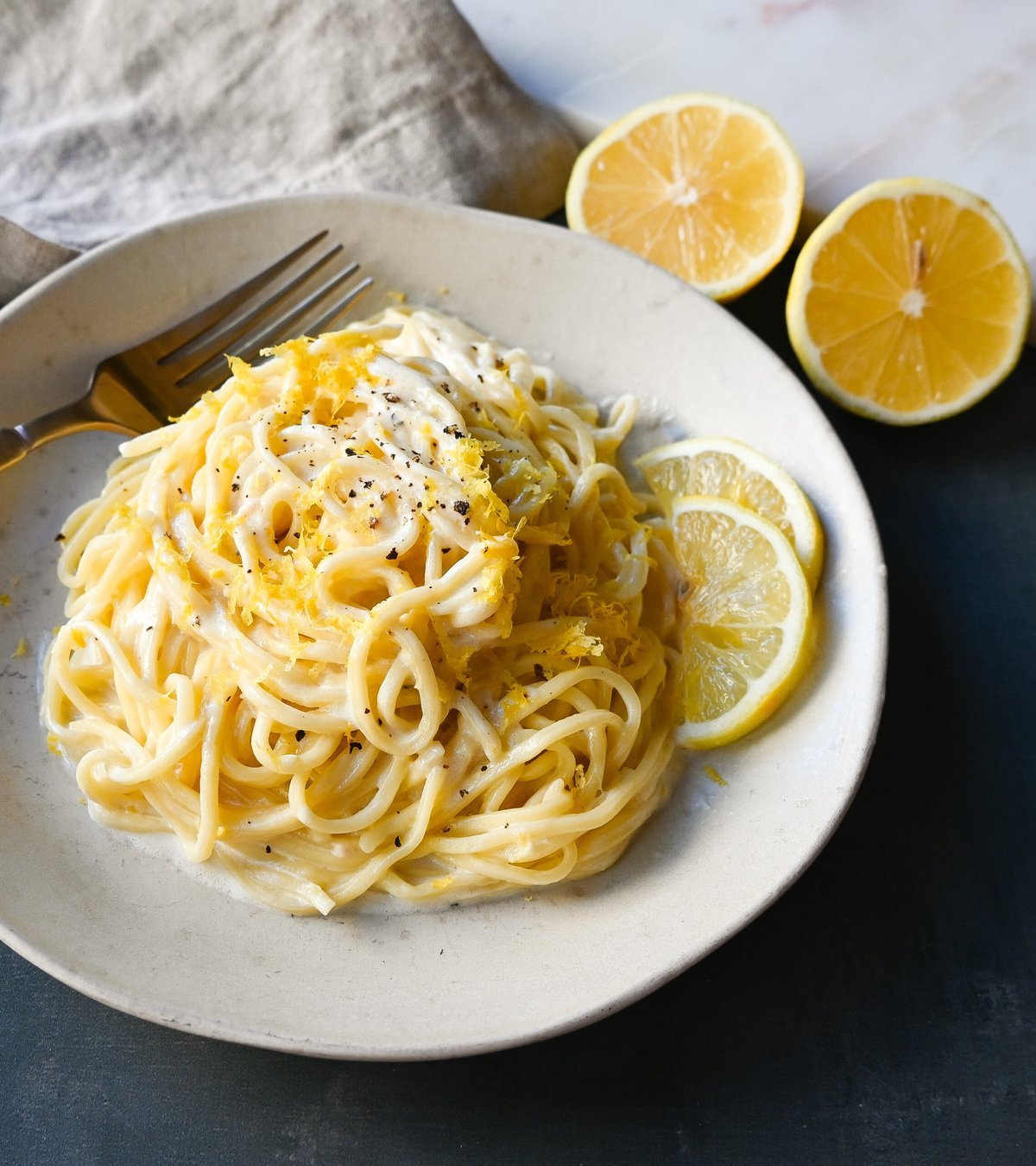 Lemon Pasta (Spaghetti al Limone). This creamy and tangy pasta dish features fresh lemon cream sauce tossed with fresh pasta. This Spaghetti al Limone is vibrant, fresh, and perfectly creamy and is so easy to make!