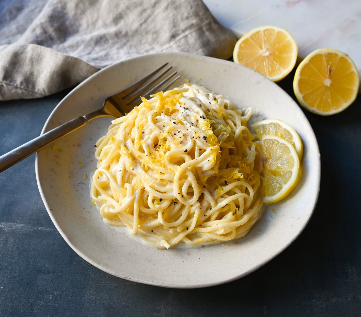 Lemon Pasta (Spaghetti al Limone). This creamy and tangy pasta dish features fresh lemon cream sauce tossed with fresh pasta. This Spaghetti al Limone is vibrant, fresh, and perfectly creamy and is so easy to make!