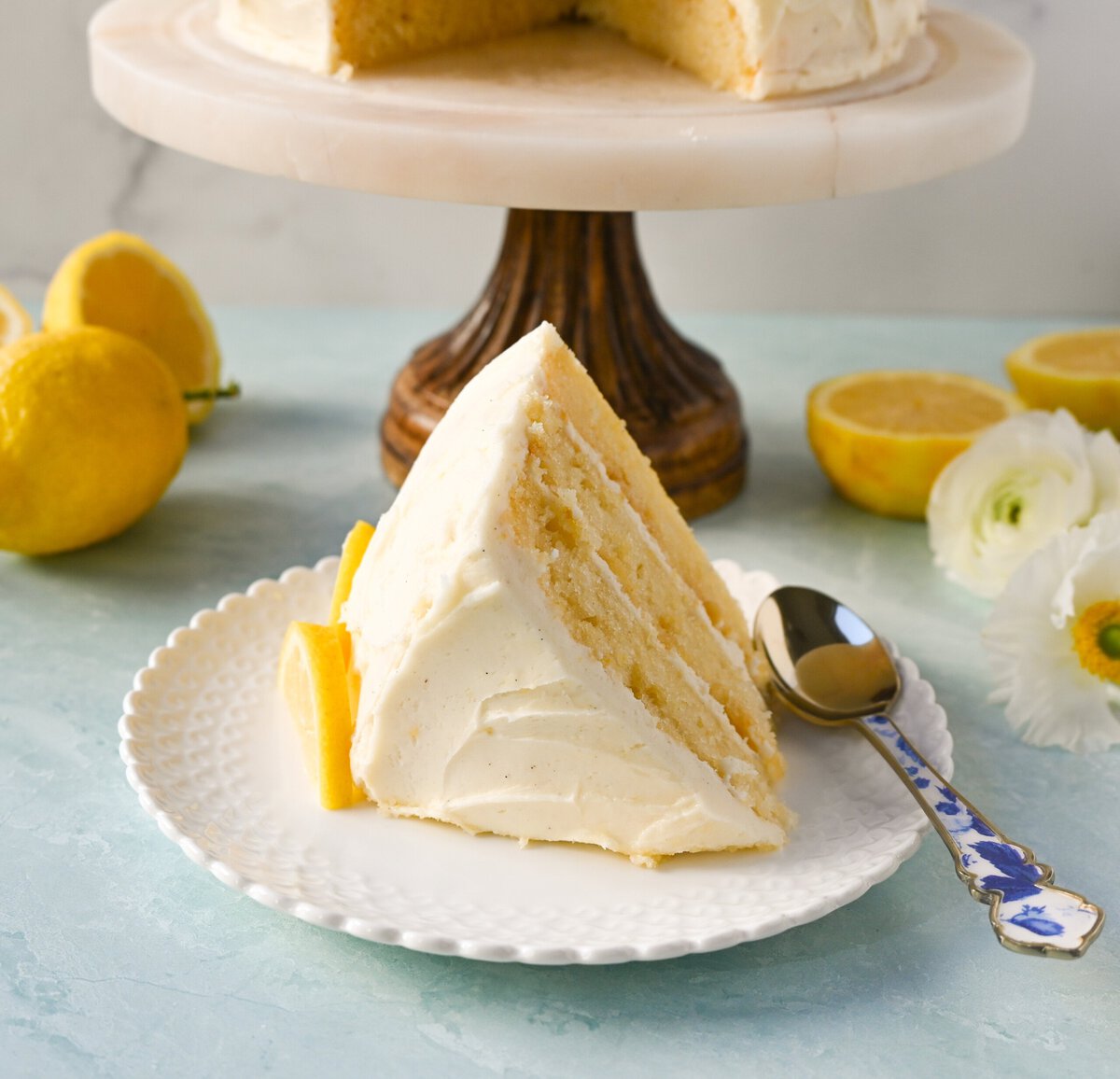 The Best Lemon Cake Recipe is moist, light, and fluffy made with fresh lemon juice and layered with lemon curd and lemon cream cheese frosting. This is the lemon cake of your dreams!