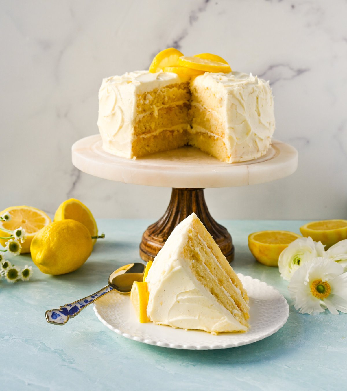 The Best Lemon Cake Recipe is moist, light, and fluffy made with fresh lemon juice and layered with lemon curd and lemon cream cheese frosting. This is the lemon cake of your dreams!