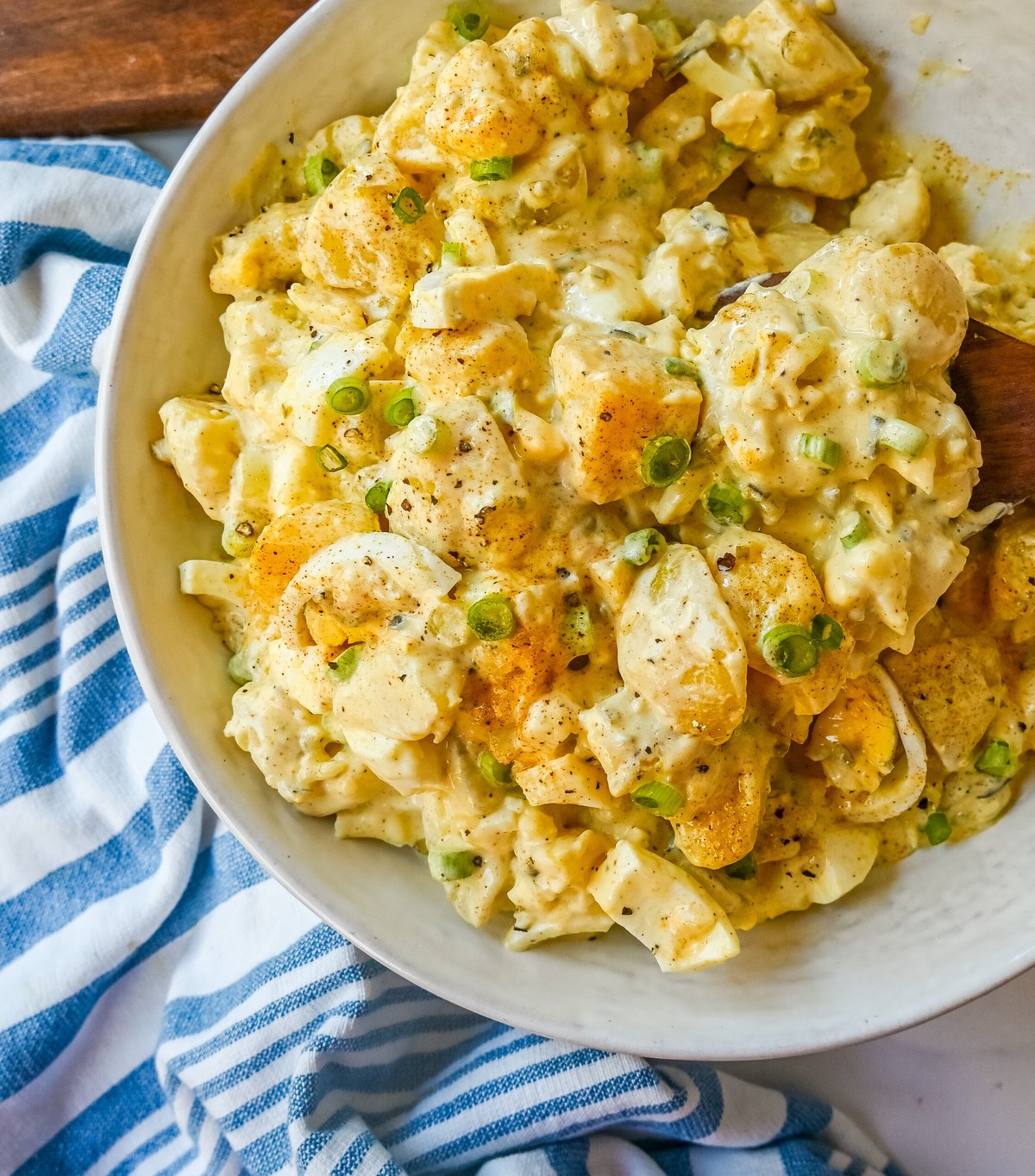 Best Potato Salad Recipe. This Mama's Potato Salad is a classic potato salad recipe made with potatoes, hard boiled eggs, sweet pickles, mayonnaise, mustard, spices, and a touch of green onion. This is the best potato recipe you will ever eat!