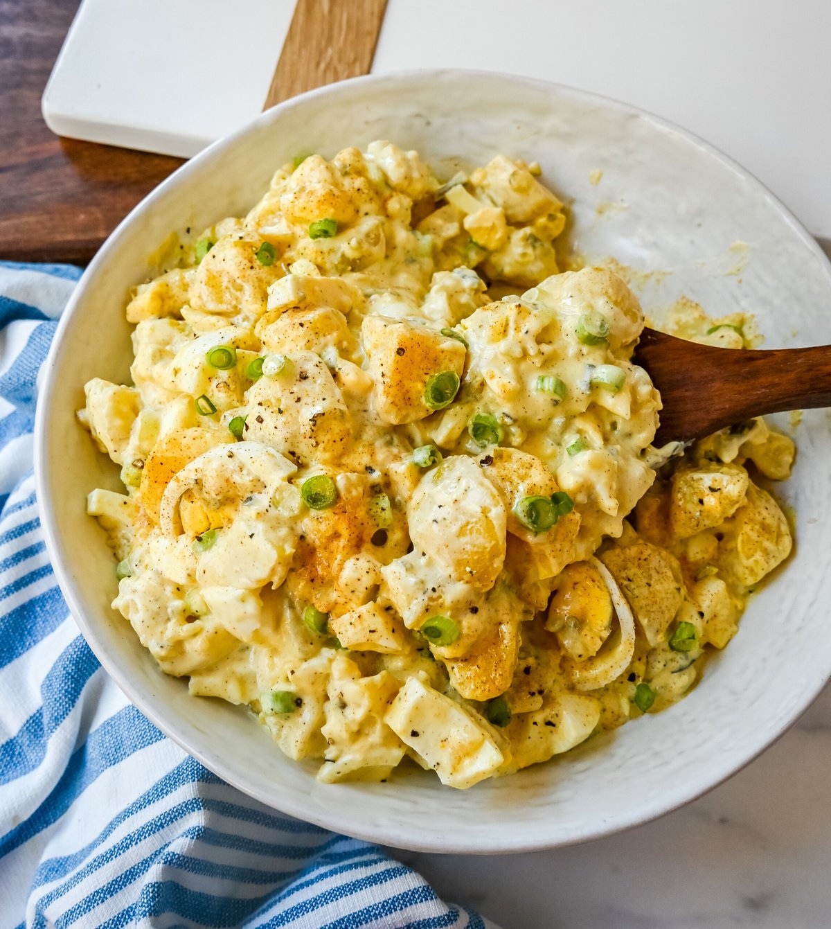 Best Potato Salad Recipe. This Mama's Potato Salad is a classic potato salad recipe made with potatoes, hard boiled eggs, sweet pickles, mayonnaise, mustard, spices, and a touch of green onion. This is the best potato recipe you will ever eat!