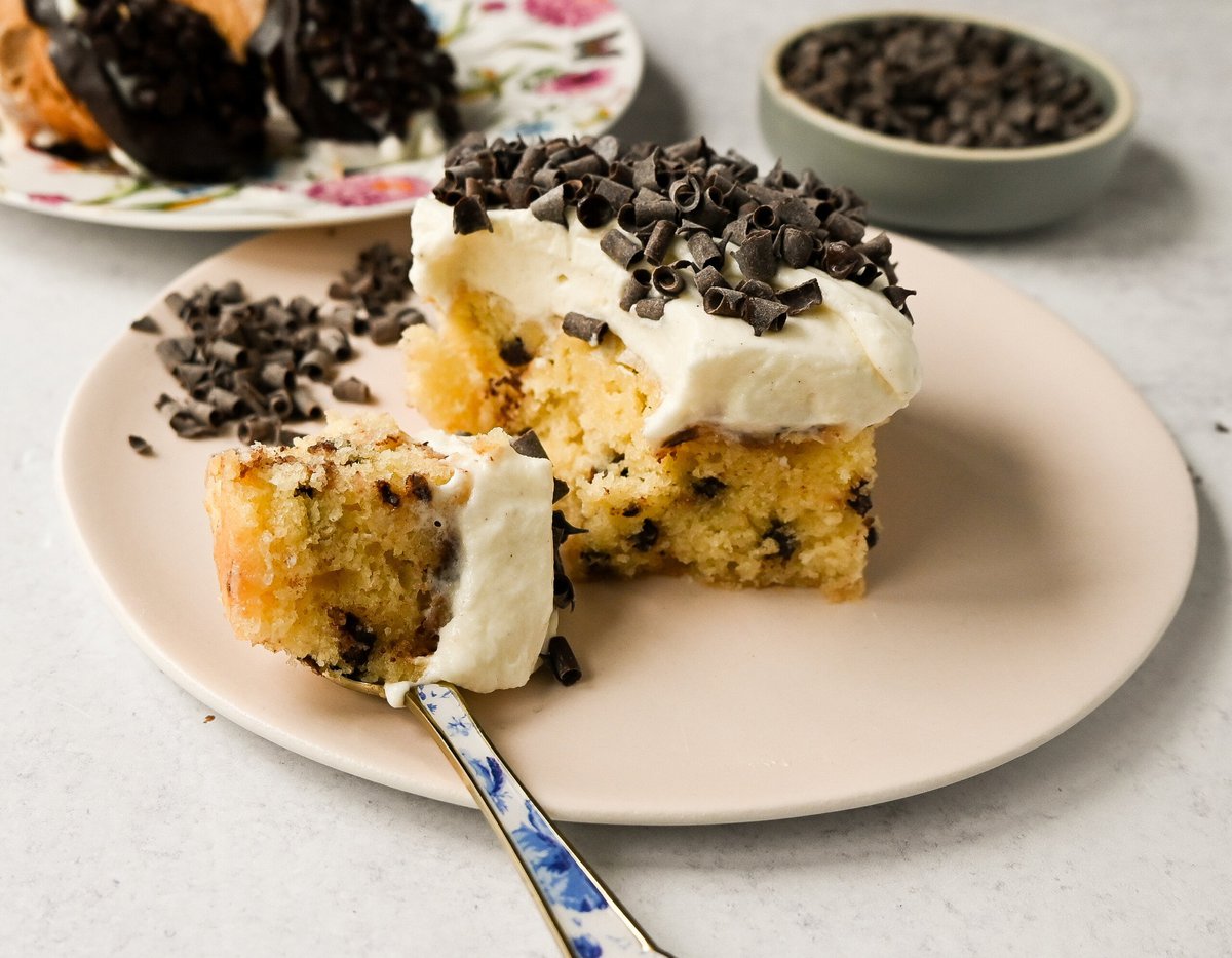Cannoli Sheet Cake. A light and fluffy yellow chocolate chip cake topped with a sweet ricotta cream topping and mini chocolate chips. All of the flavor of a cannoli in a delicious cake.