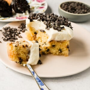 Cannoli Sheet Cake. A light and fluffy yellow chocolate chip cake topped with a sweet ricotta cream topping and mini chocolate chips. All of the flavor of a cannoli in a delicious cake.