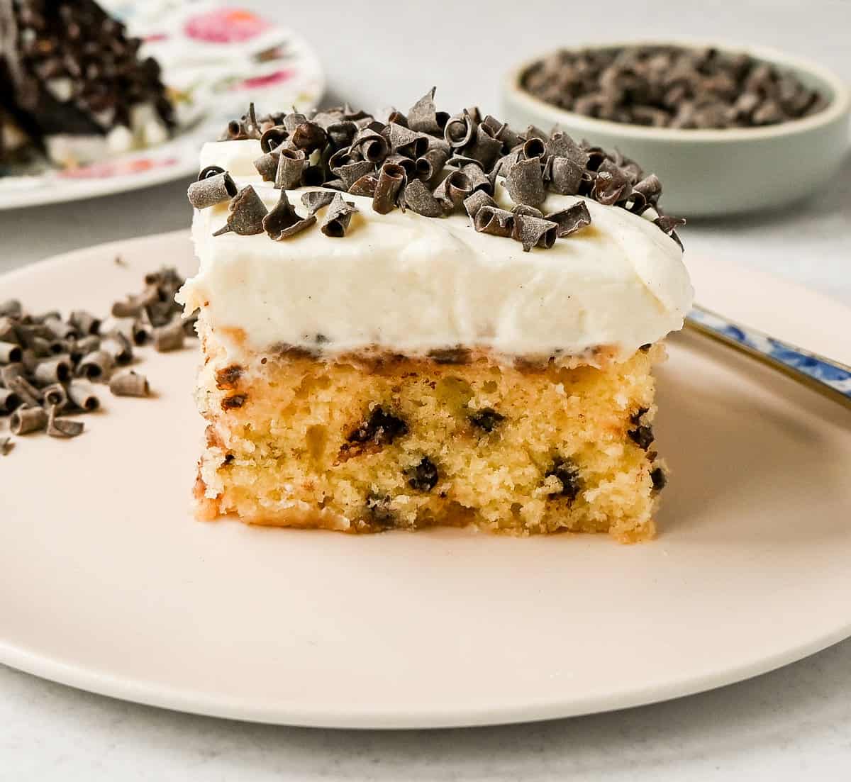 Cannoli Sheet Cake. A light and fluffy yellow chocolate chip cake topped with a sweet ricotta cream topping and mini chocolate chips. All of the flavor of a cannoli in a delicious cake.