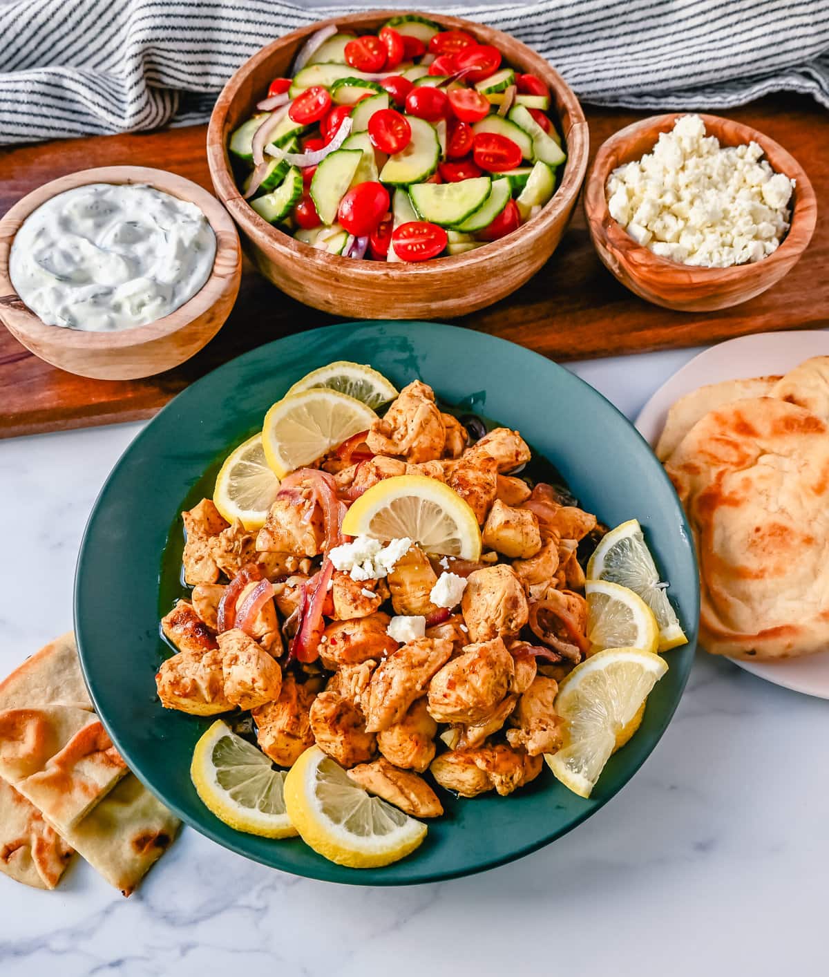 Oven Roasted Chicken Shawarma. Juicy, flavorful Chicken Shawarma made with chicken in a bright, spiced lemon marinade baked in the oven until perfectly cooked. This is such an easy chicken shawarma recipe!