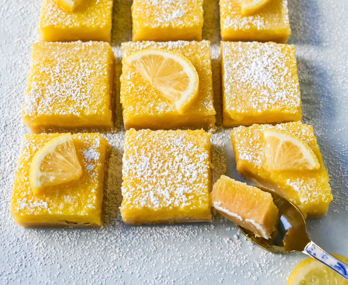 Lemon Bars. These classic lemon bars are made with tangy and sweet lemon curd and a buttery shortbread crust. If you love lemon desserts, you will love this lemon bar recipe. How to make the perfect lemon bar!