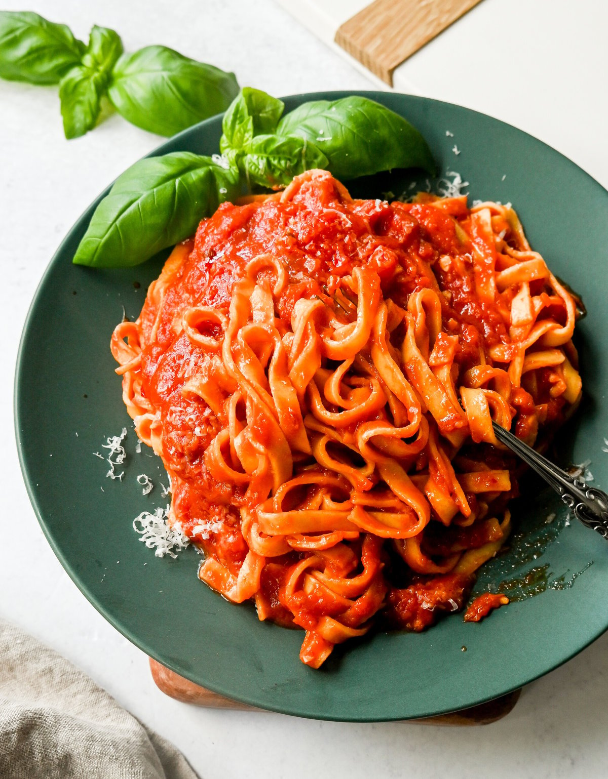 Mi Amor Spicy Pasta. This homemade spicy arrabbiata sauce is made with chopped calabrian chilies for the perfect amount of heat, tossed with fresh pasta and topped with Parmigiano Reggiano cheese and fresh basil. This is the perfect spicy pasta recipe!