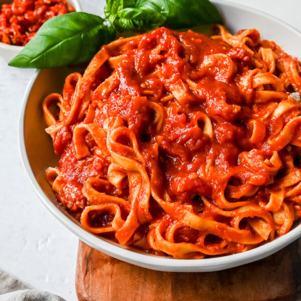 Mi Amor Spicy Pasta. This homemade spicy arrabbiata sauce is made with chopped calabrian chilies for the perfect amount of heat, tossed with fresh pasta and topped with Parmigiano Reggiano cheese and fresh basil. This is the perfect spicy pasta recipe!