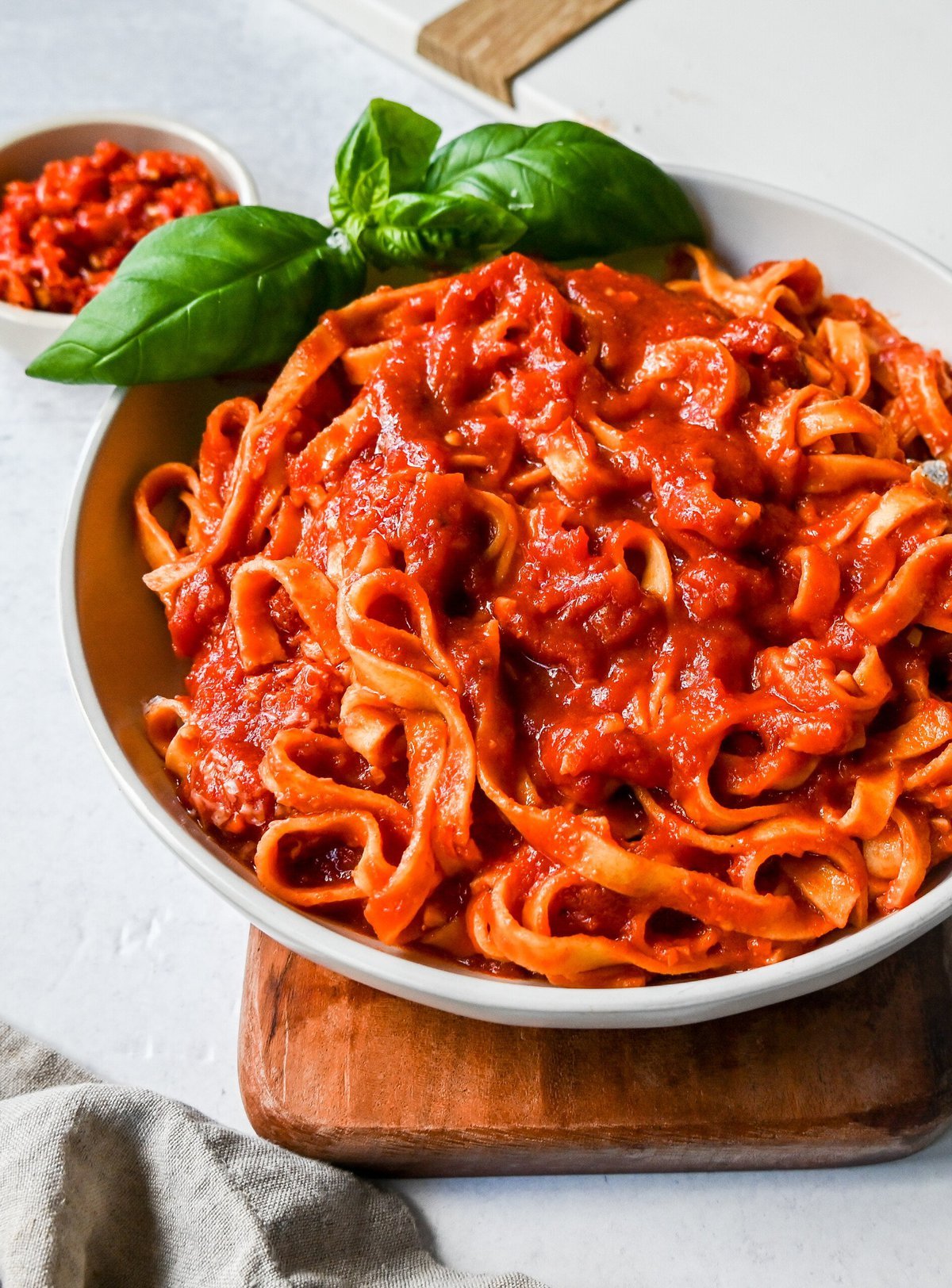 Mi Amor Spicy Pasta. This homemade spicy arrabbiata sauce is made with chopped calabrian chilies for the perfect amount of heat, tossed with fresh pasta and topped with Parmigiano Reggiano cheese and fresh basil. This is the perfect spicy pasta recipe!