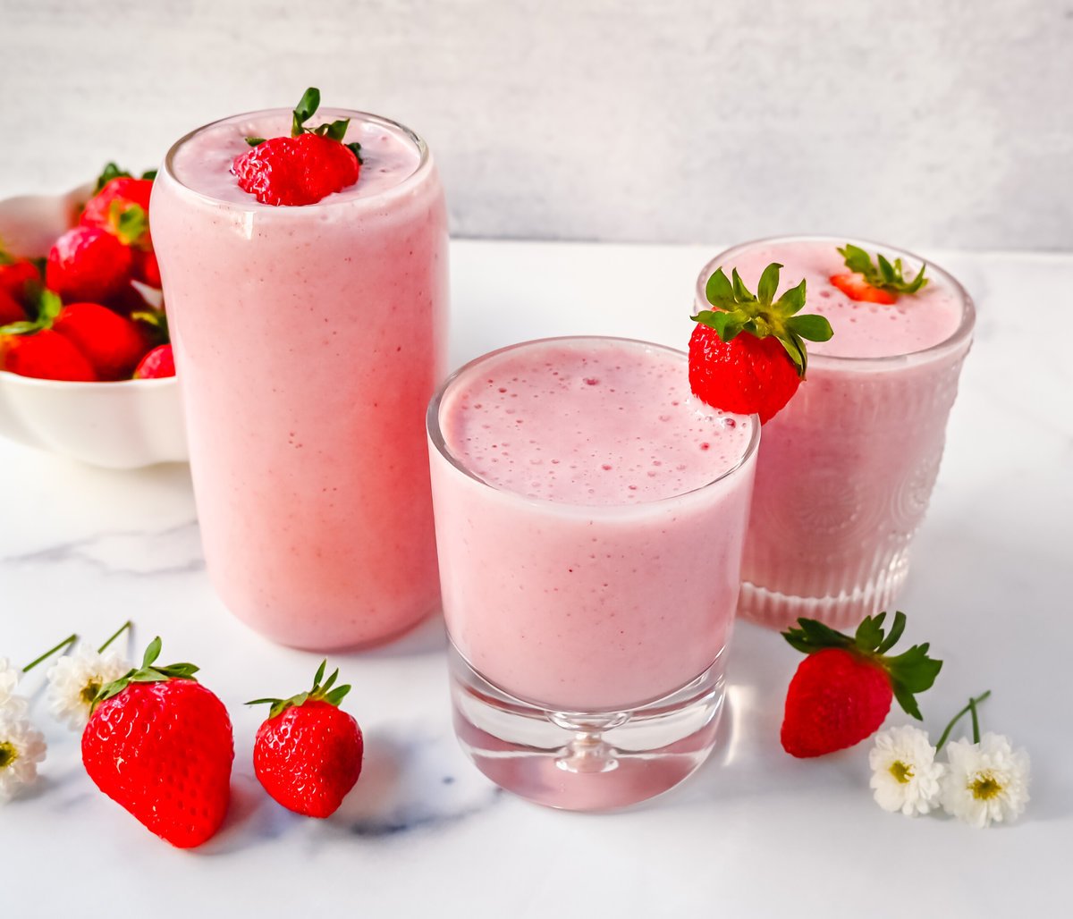 Strawberry Banana Smoothie Recipe. This easy, creamy, refreshing 4-ingredient Strawberry Banana Smoothie is made with strawberries, banana, milk, and a touch of honey and is such a healthy breakfast to start your day.