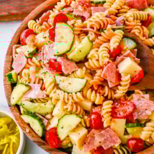 Easy Pasta Salad. This Quick and Easy Pasta Salad Recipe is made with pasta, fresh vegetables, cheese, salami, all tossed with a secret ingredient and Olive Garden Italian dressing. It is the best pasta salad recipe and the most flavorful side dish.
