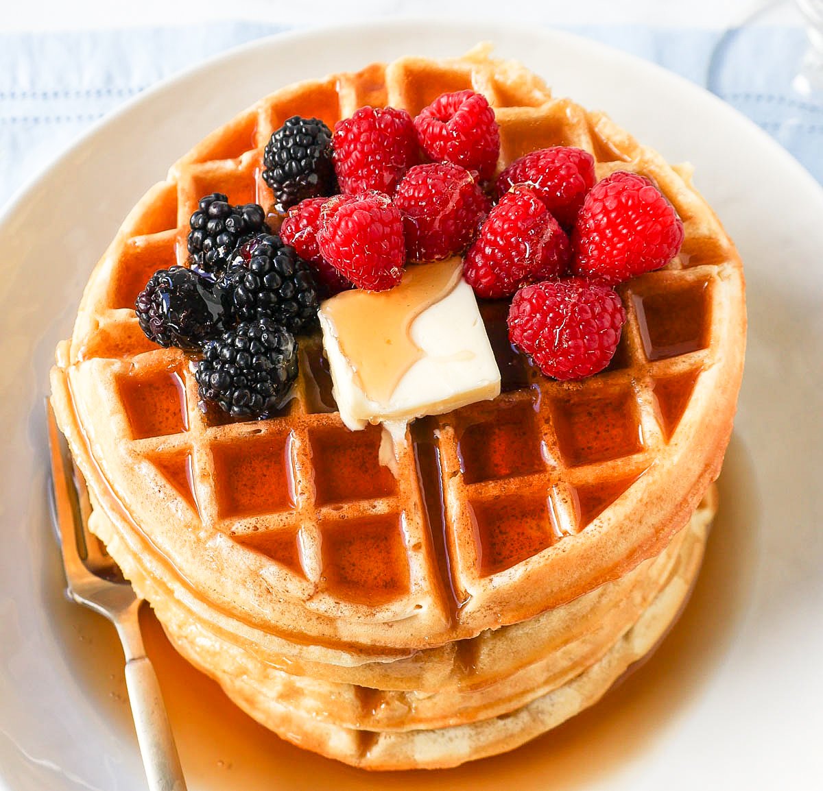 Buttermilk Waffles. How to make the best homemade Belgian waffles at home. Buttermilk waffles with crispy edges and chewy centers make the perfect weekend breakfast!