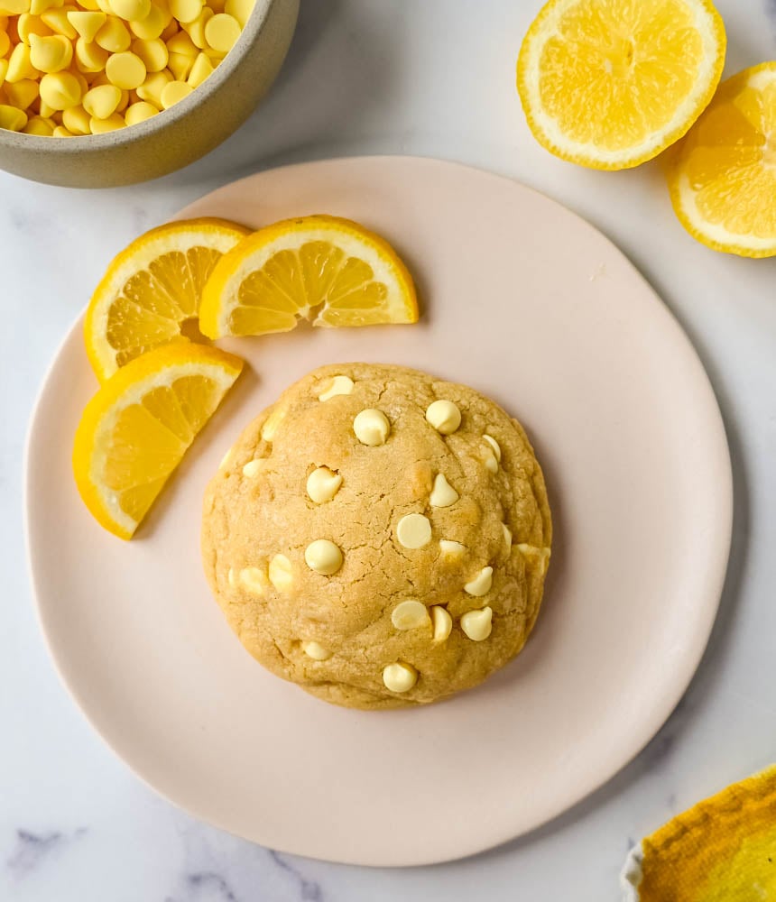 Levain Bakery Lemon Cookies. These soft, thick, chewy, bakery-style Levain Bakery Lemon Cookies are made with three types of lemon flavoring plus lemon chips. You will love these bakery style lemon cookies!