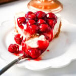 No Bake Cheesecake Recipe. This easy no bake cheesecake is made with only 7 ingredients and doesn't require baking in the oven. It has a light, creamy, velvety and rich cheesecake filling paired with a buttery crust. It is the perfect no bake dessert recipe.