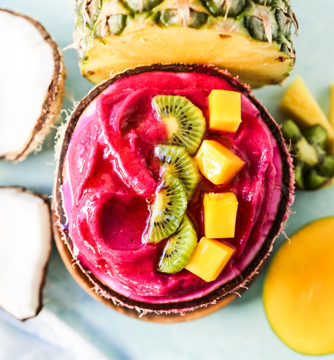 Dragon fruit (pitaya) smoothie bowls are a creamy frozen blend of tropical fruits topped with granolas, seeds, and other toppings that will give you healthy energy throughout the day. 