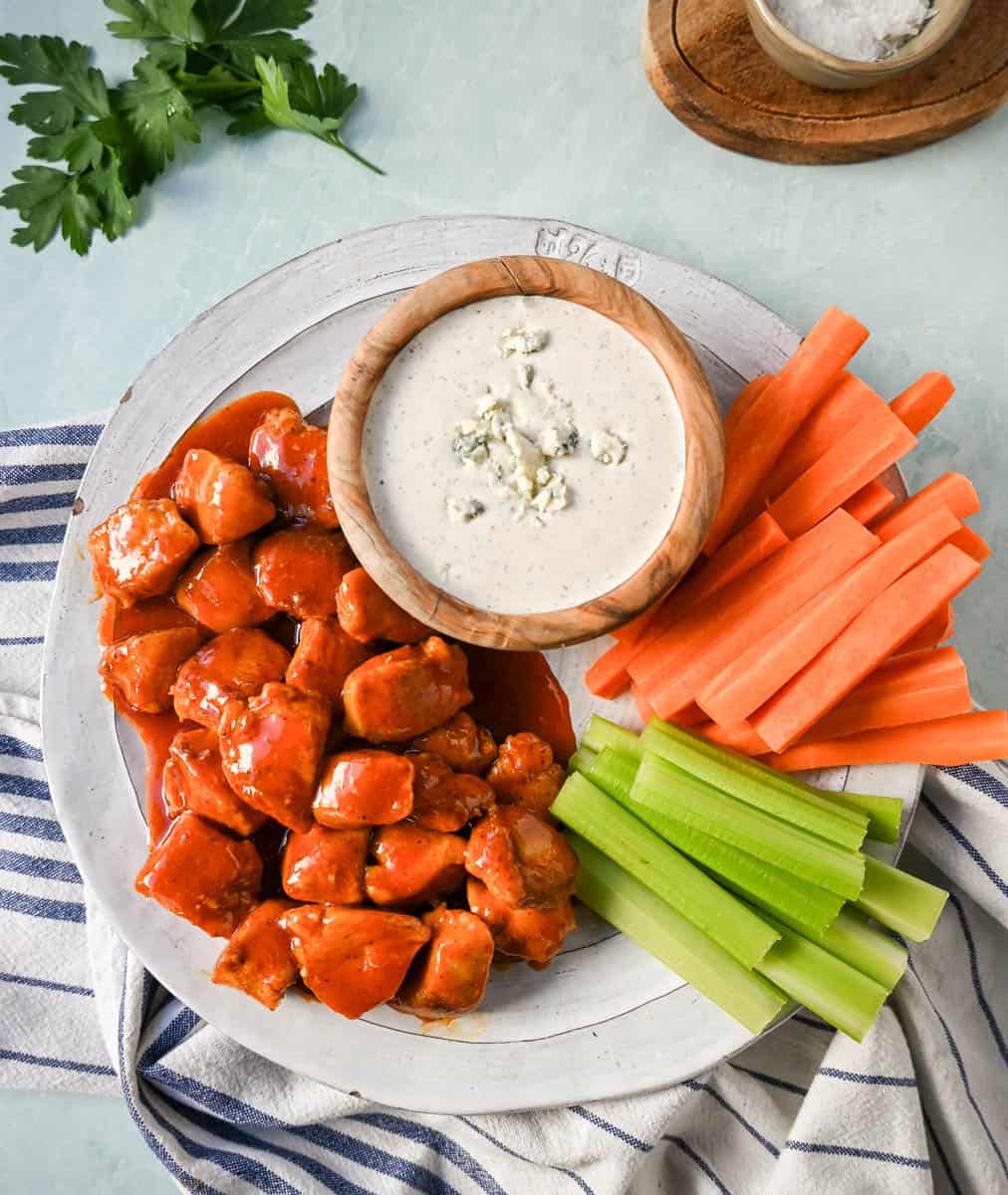Buffalo Chicken Bites. f you love the flavor of buffalo chicken wings but want a lighter, healthier version, you will love these easy buffalo chicken bites without the breading and no frying.