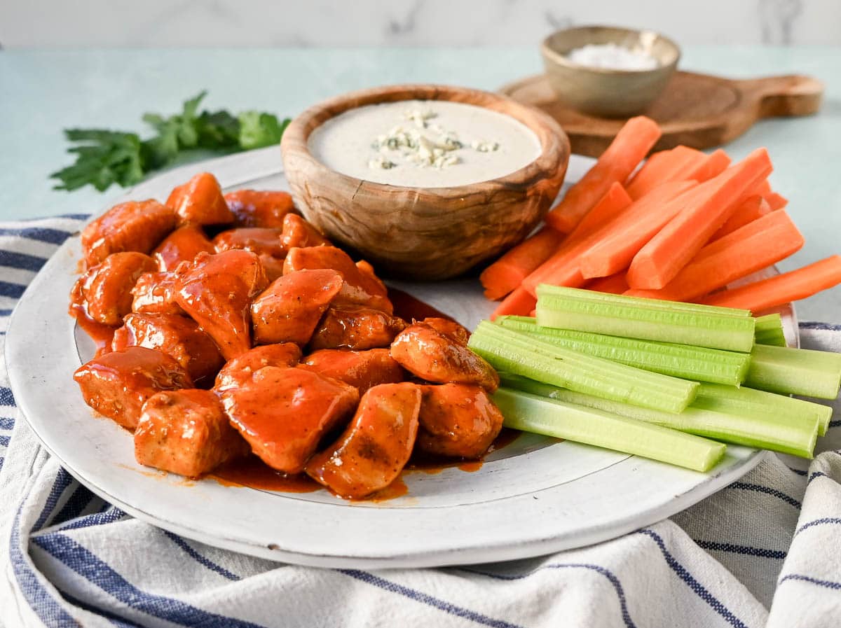 Buffalo Chicken Bites. f you love the flavor of buffalo chicken wings but want a lighter, healthier version, you will love these easy buffalo chicken bites without the breading and no frying.