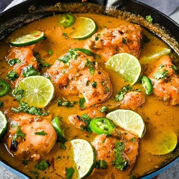 This Skillet Coconut Lime Chicken is made with a homemade coconut lime sauce crafted from creamy canned coconut milk, zesty fresh lime juice, and a touch of garlic and ginger and has the perfect sweet, savory, and tangy flavors. It is paired with tender, juicy chicken breasts for a quick, easy, and flavorful one-skillet dinner.