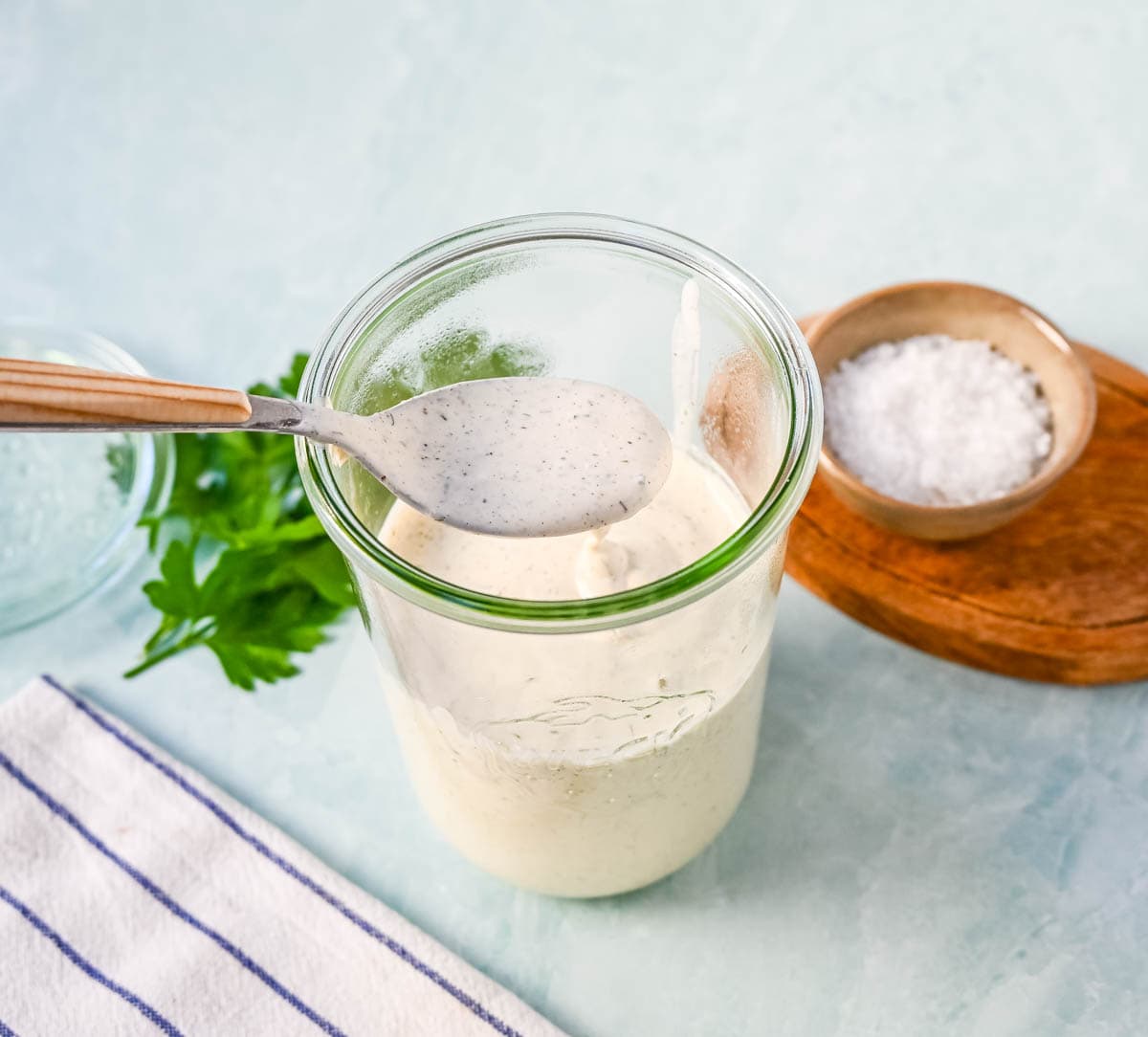 This creamy homemade ranch dressing is better than the bottled ranch dressing you find in the grocery store. This is made with fresh ingredients and vibrant herbs and is so easy to make. This is the best ranch dressing recipe!