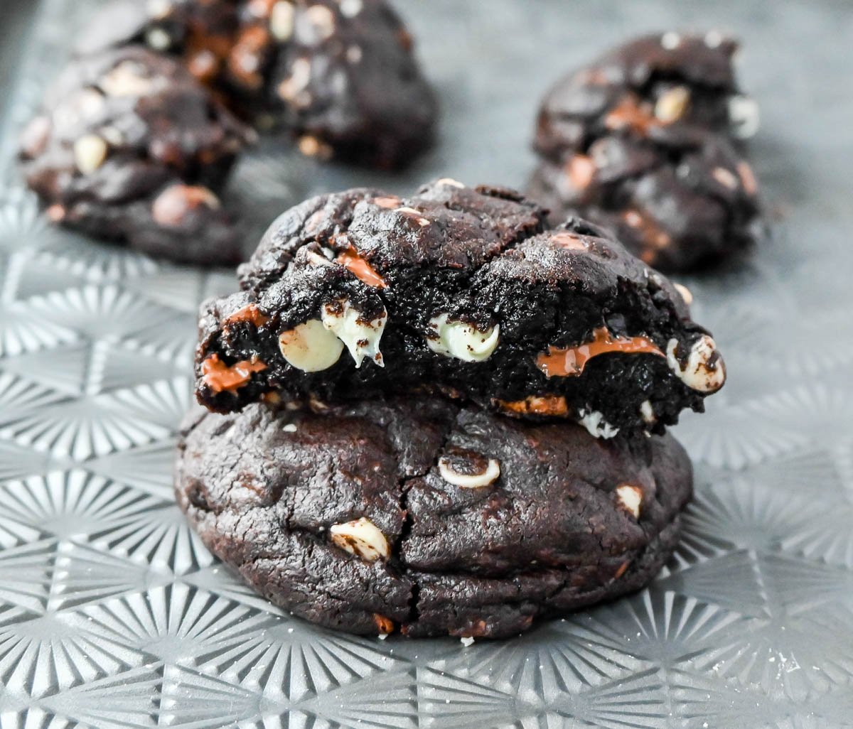 This Levain Bakery Black and White Cookie is a soft, thick, and chewy dark chocolate cookie with white chocolate and milk chocolate chips. It is a bakery-style triple chocolate chip cookie recipe for chocolate lovers!