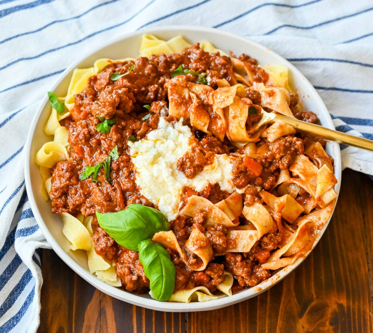 Beef Bolognese. Authentic Italian Beef Bolognese Sauce on top of fresh pasta is a warm, weeknight dish made in less than 30 minutes.