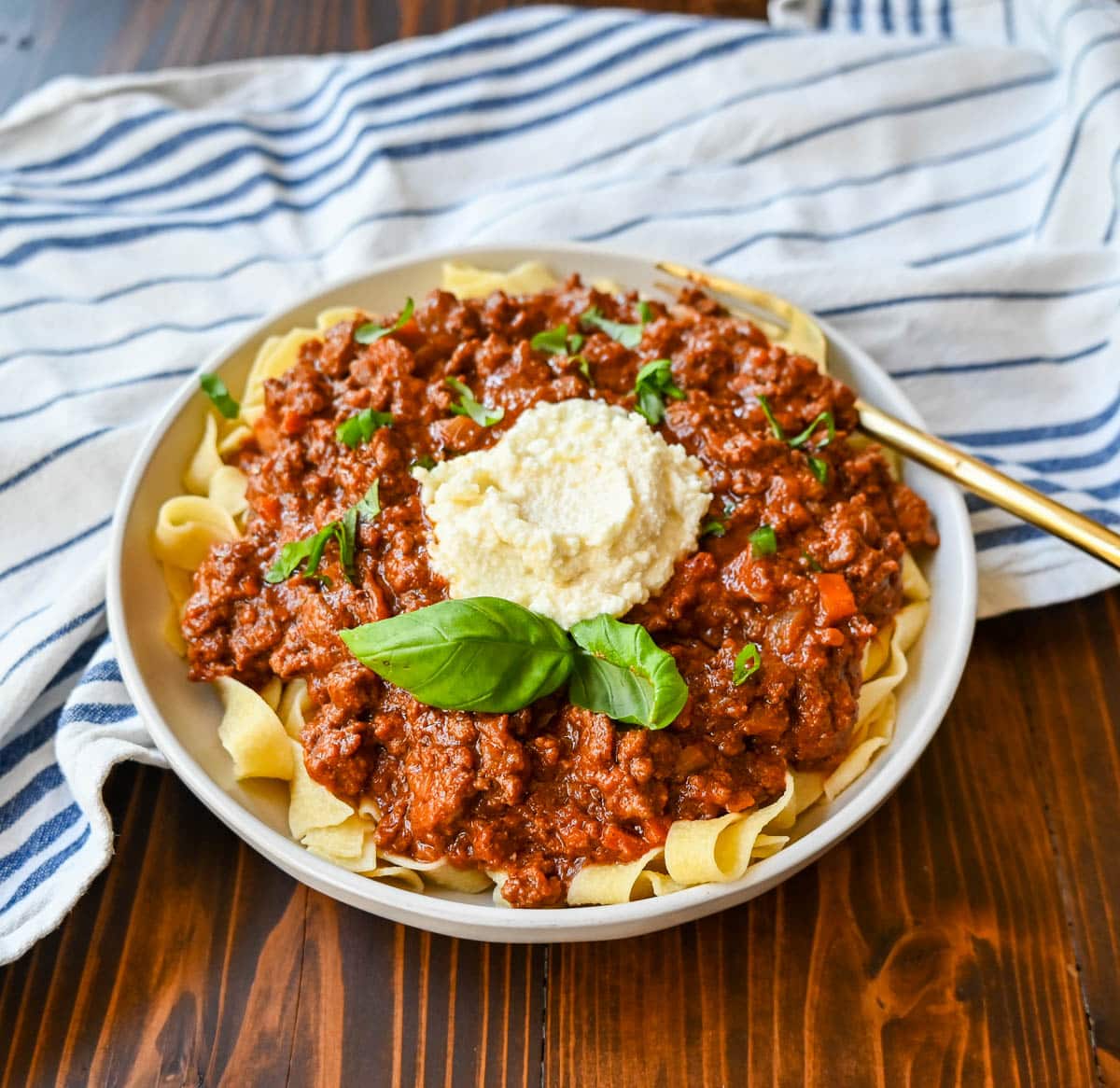 Beef Bolognese. Authentic Italian Beef Bolognese Sauce on top of fresh pasta is a warm, weeknight dish made in less than 30 minutes.