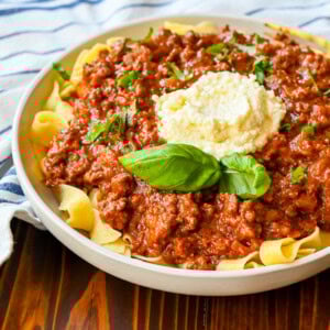 This beef bolognese recipe is rich, slow-simmered, and deeply flavorful, with tender ground beef, aromatic vegetables, and a velvety tomato sauce that clings perfectly to pasta. Inspired by authentic Italian bolognese, this homemade sauce develops incredible depth as it cooks, creating a hearty, comforting dish that tastes even better the next day. This is the best bolognese sauce for bold flavor and perfect texture.