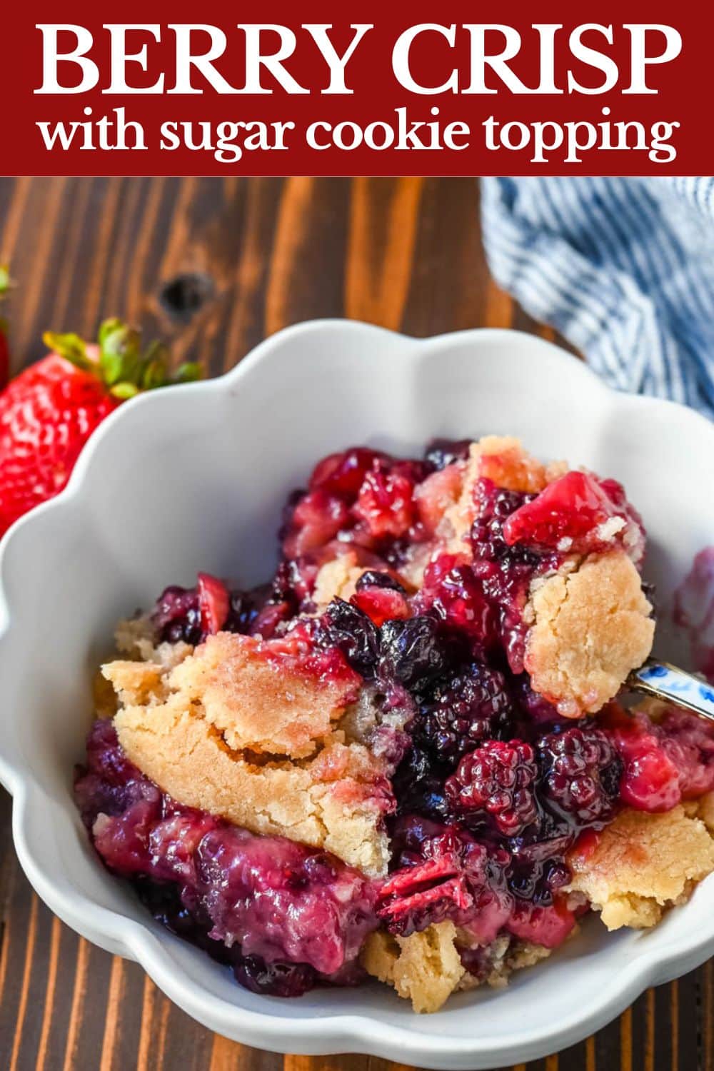 This homemade Berry Crisp is made with fresh Raspberries, Blackberries, Strawberries, and Blueberries and topped with a buttery sugar cookie crumble topping. This berry crumble is the perfect summer dessert.