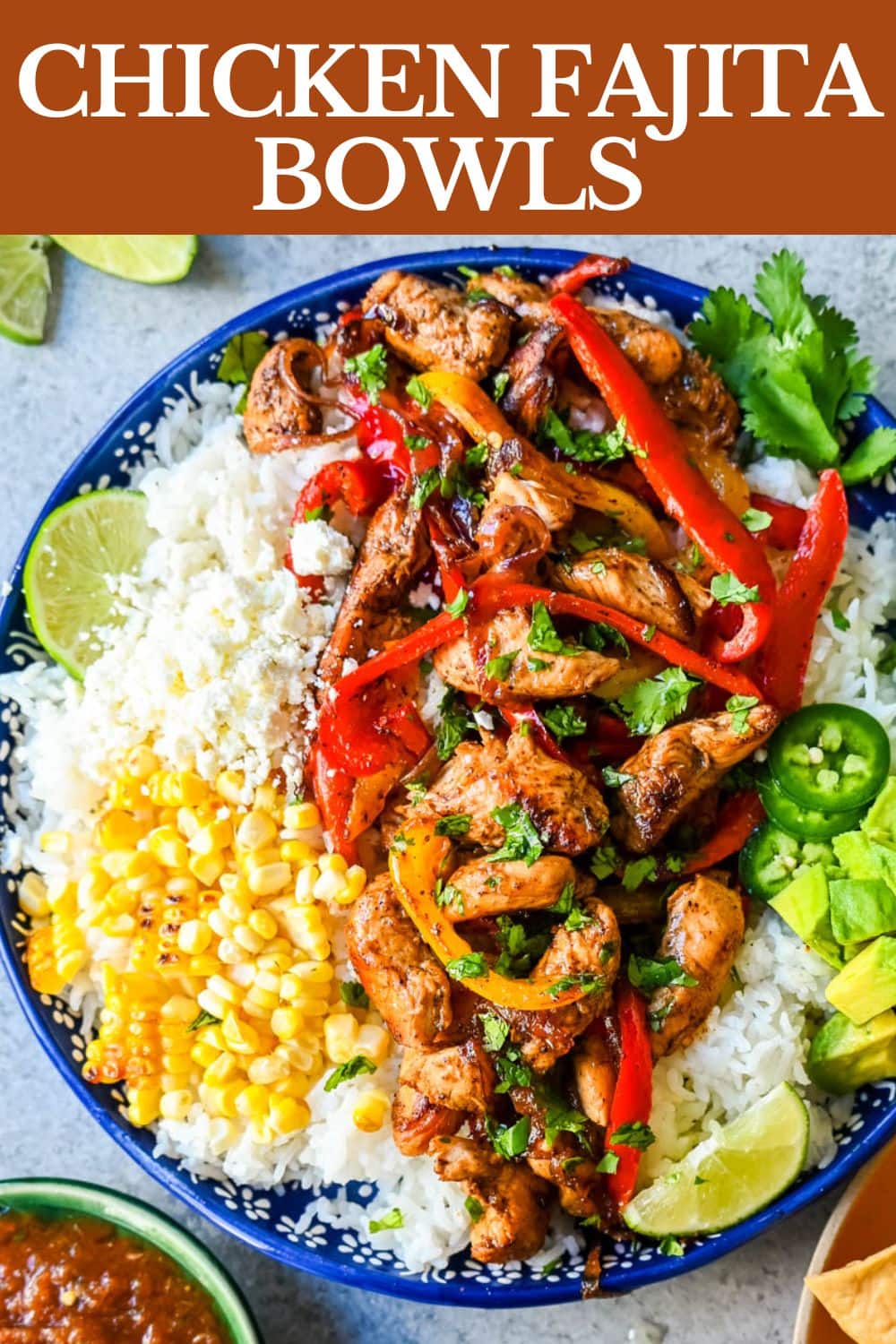 Chicken Fajita Bowl. Juicy, flavorful chicken fajitas in a bowl with rice, beans, charred corn, guacamole, salsa, and fresh cilantro. The flavors of chicken fajitas without the tortillas!