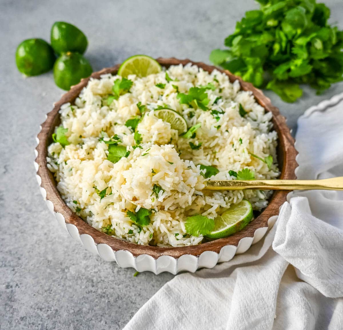 How to make the best homemade cilantro lime rice at home. This fluffy and flavorful cilantro lime rice is the perfect Mexican side dish recipe.