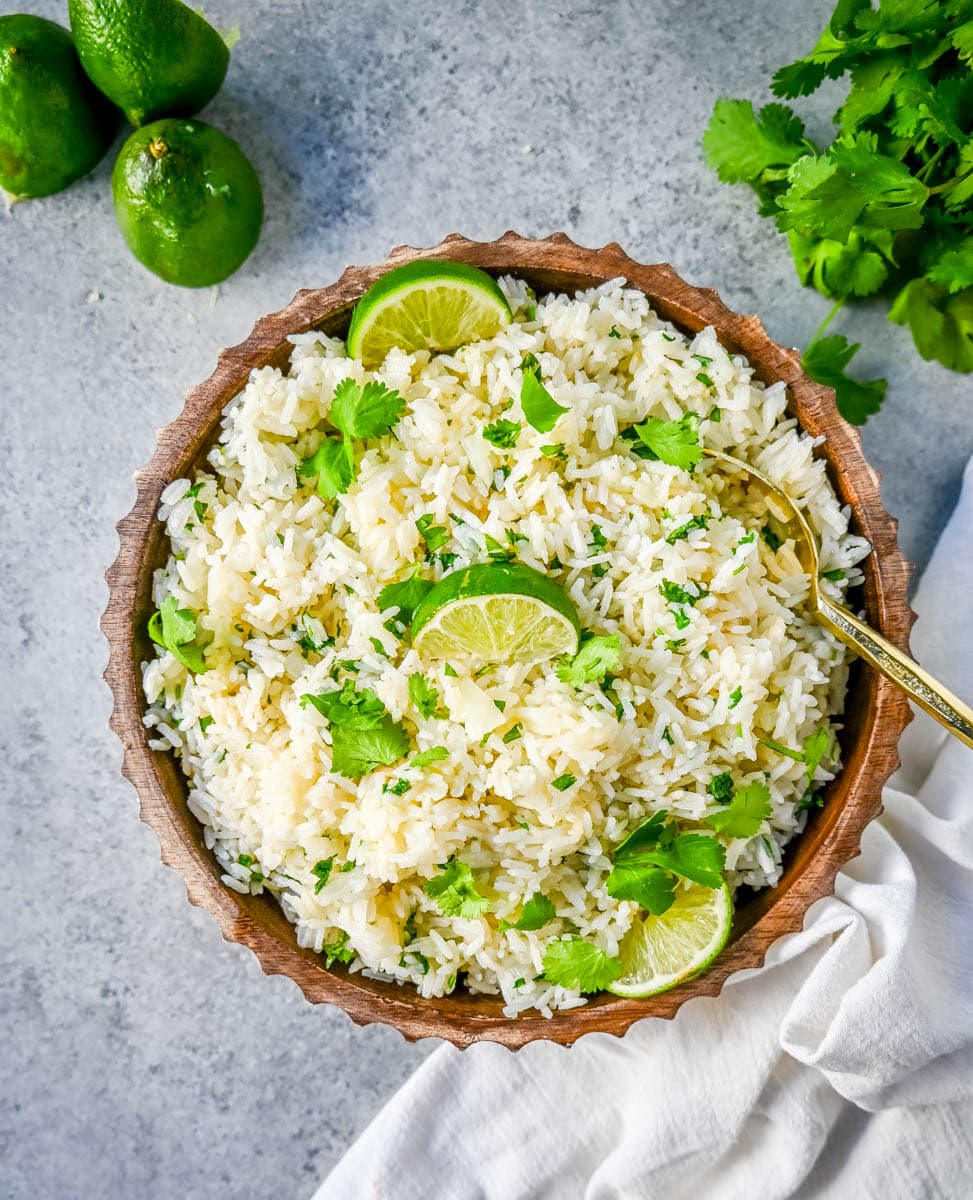 How to make the best homemade cilantro lime rice at home. This fluffy and flavorful cilantro lime rice is the perfect Mexican side dish recipe.