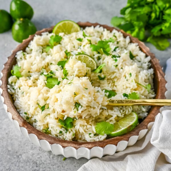 How to make the best homemade cilantro lime rice at home. This fluffy and flavorful cilantro lime rice is the perfect Mexican side dish recipe.