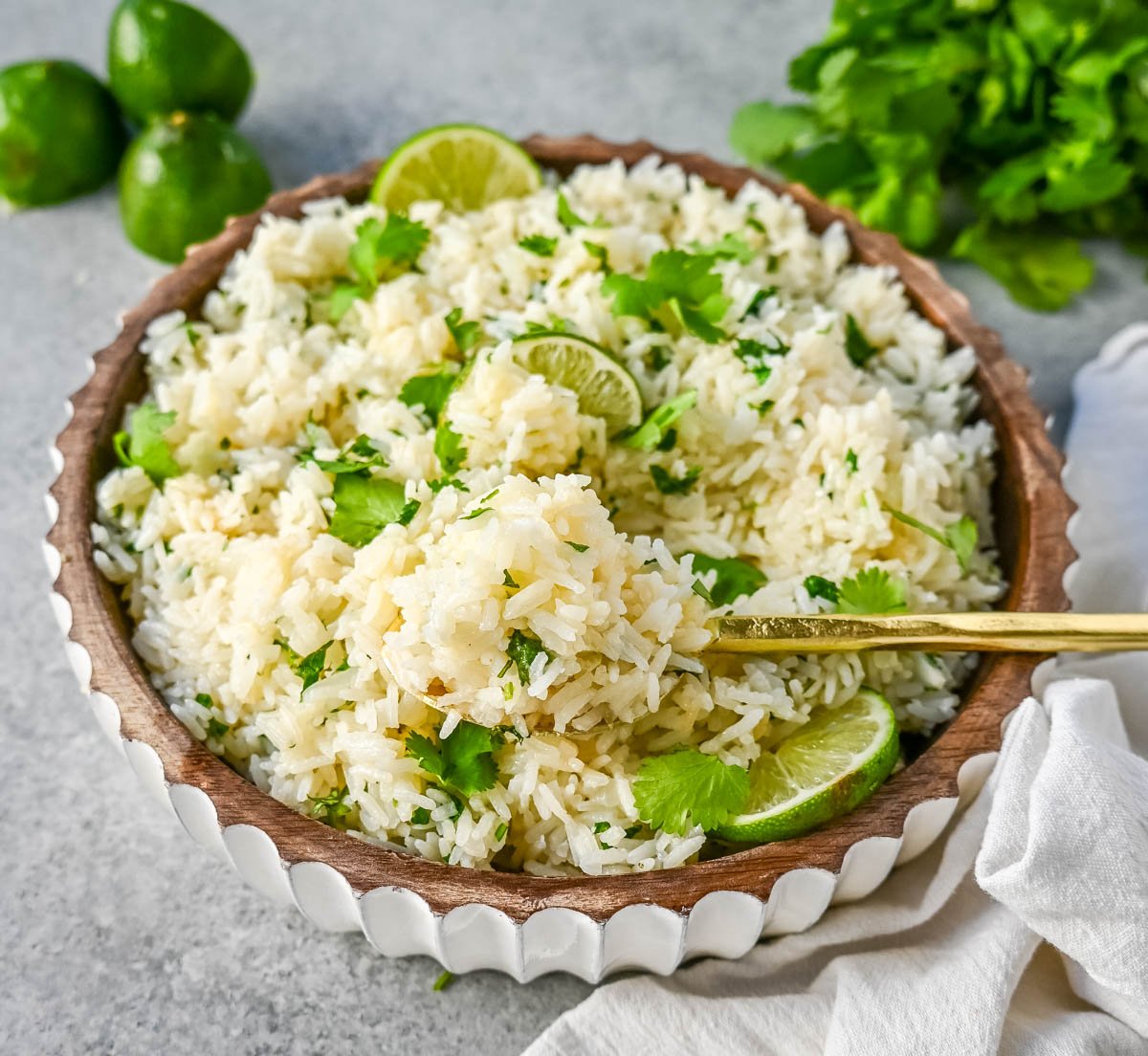 How to make the best homemade cilantro lime rice at home. This fluffy and flavorful cilantro lime rice is the perfect Mexican side dish recipe.