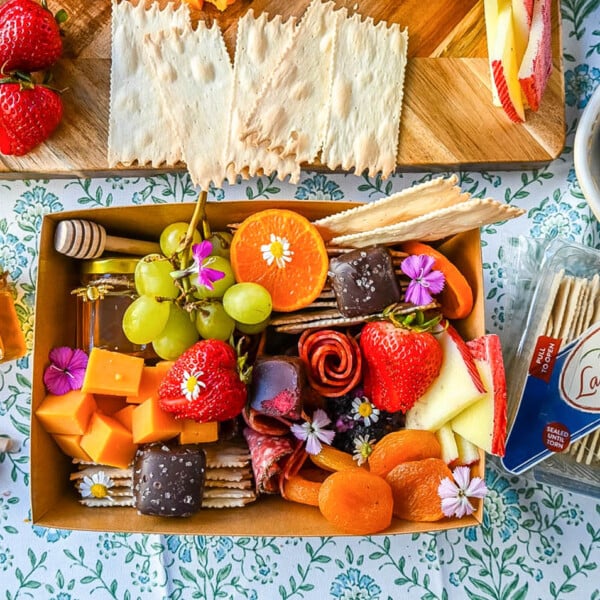 Charcuterie boards have become the epitome of gourmet snacking. But what if you are craving a charcuterie board but you want it on a smaller scale? Enter the mini charcuterie box – a perfect personal-sized grazing box that packs all the flavor in a small package.