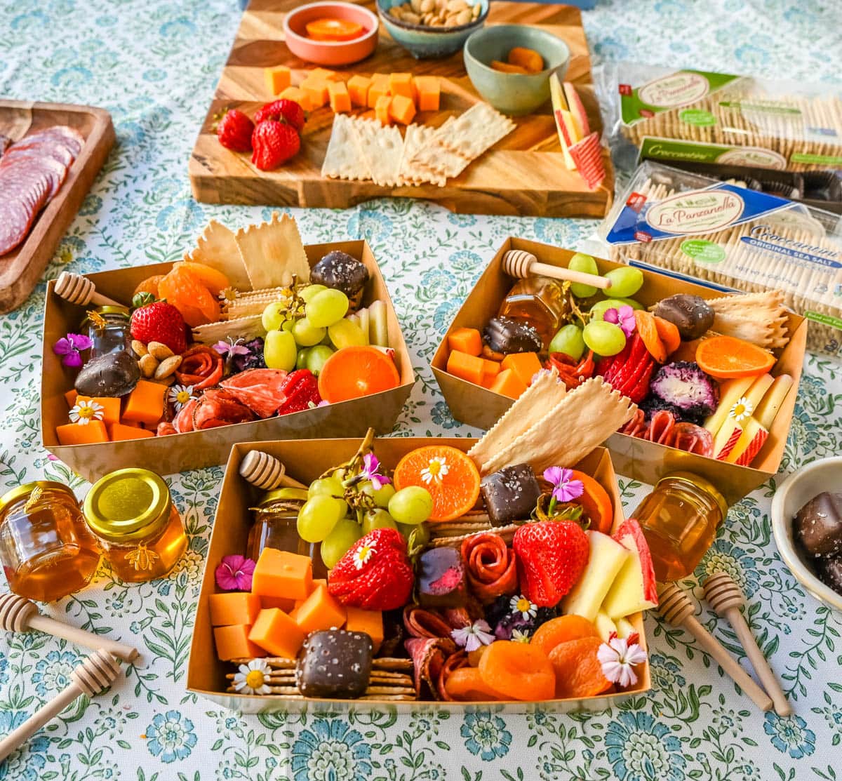Charcuterie boards have become the epitome of gourmet snacking. But what if you are craving a charcuterie board but you want it on a smaller scale? Enter the mini charcuterie box – a perfect personal-sized grazing box that packs all the flavor in a small package. 