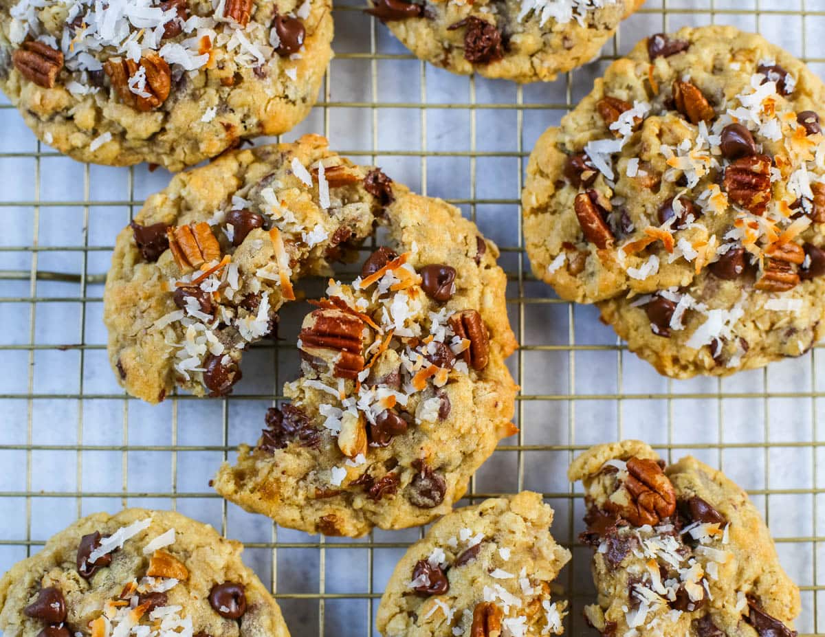 These soft, chewy, chunky Cowboy Cookies are made with oats, chocolate chips, shredded coconut, and pecans making them perfectly sweet, salty, nutty, and hearty. This is the best Cowboy Cookies recipe!