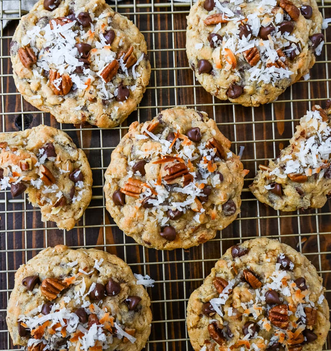These soft, chewy, chunky Cowboy Cookies are made with oats, chocolate chips, shredded coconut, and pecans making them perfectly sweet, salty, nutty, and hearty. This is the best Cowboy Cookies recipe!