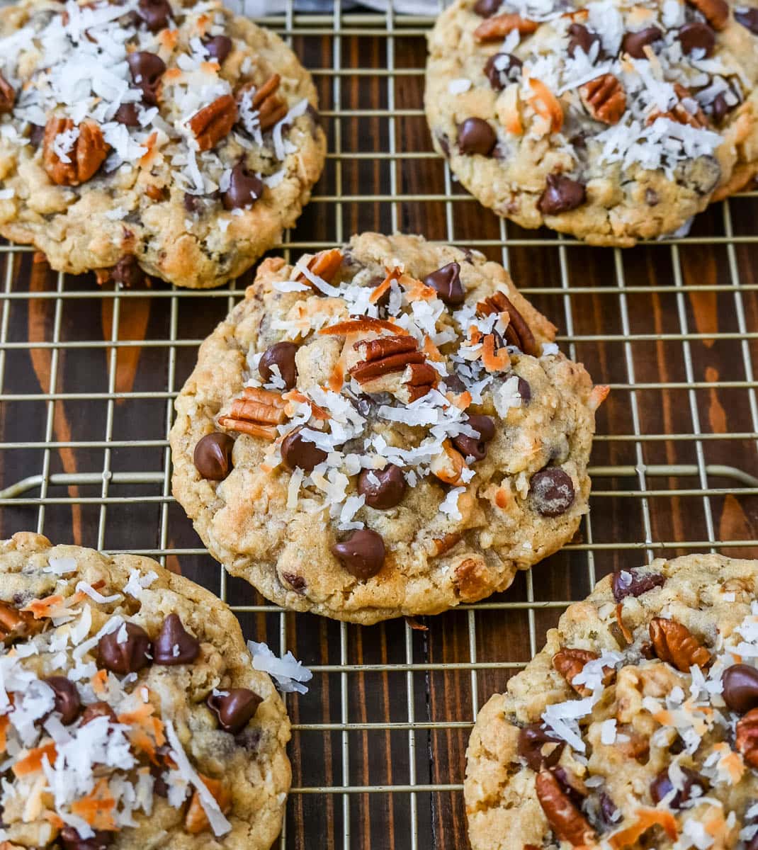 These soft, chewy, chunky Cowboy Cookies are made with oats, chocolate chips, shredded coconut, and pecans making them perfectly sweet, salty, nutty, and hearty. This is the best Cowboy Cookies recipe!
