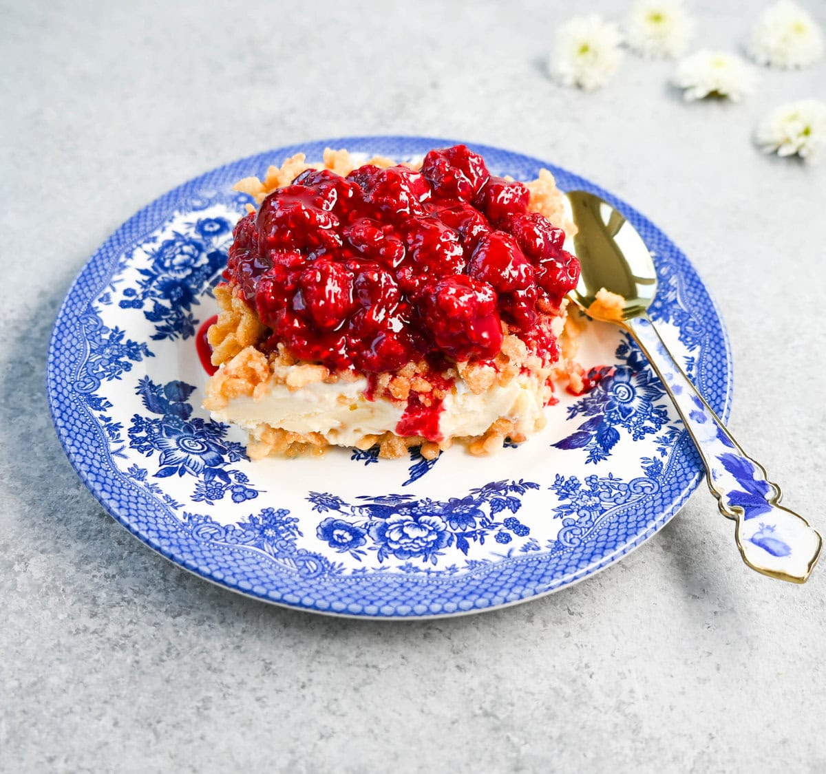 Crunchy Munchy Ice Cream Dessert. This popular ice cream dessert has a crunchy topping made with browned butter, sugar, and Rice Krispies cereal and is layered between vanilla ice cream and topped with a homemade raspberry sauce. The best ice cream dessert recipe!