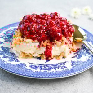 Crunchy Munchy Ice Cream Dessert. This popular ice cream dessert has a crunchy topping made with browned butter, sugar, and Rice Krispies cereal and is layered between vanilla ice cream and topped with a homemade raspberry sauce. The best ice cream dessert recipe!