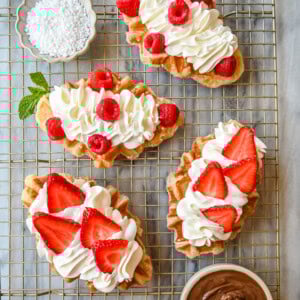 How to make the famous croffle which is croissant dough baked in a waffle iron that makes a buttery, flaky waffle that is the perfect breakfast or dessert recipe. A croffle is the ultimate fusion of a buttery, flaky croissant and a golden, crispy waffle. Top it with your favorite waffle toppings!